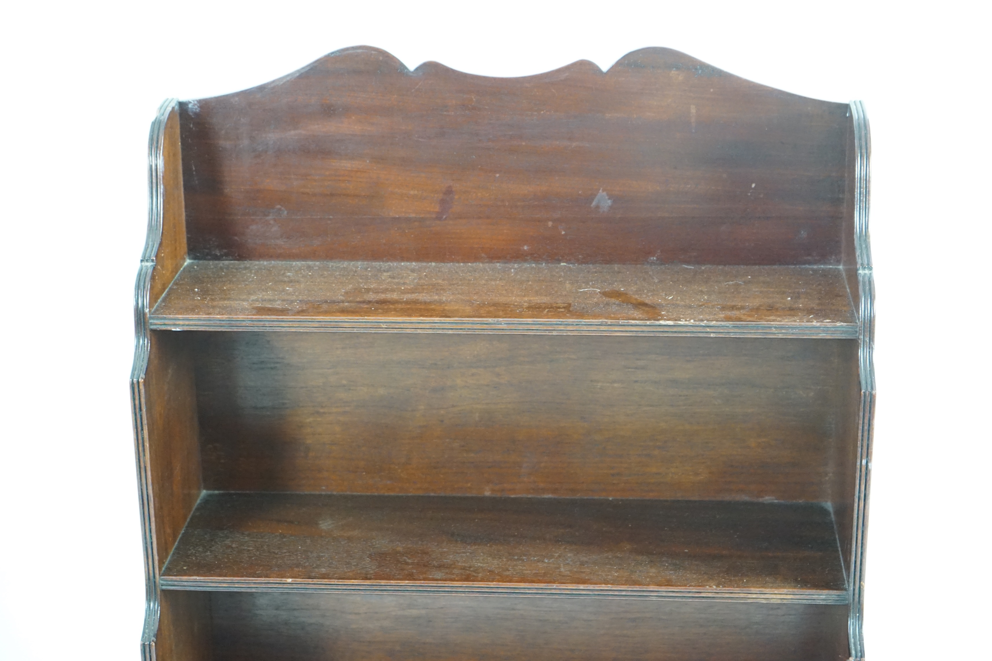 A Regency style mahogany waterfall bookcase